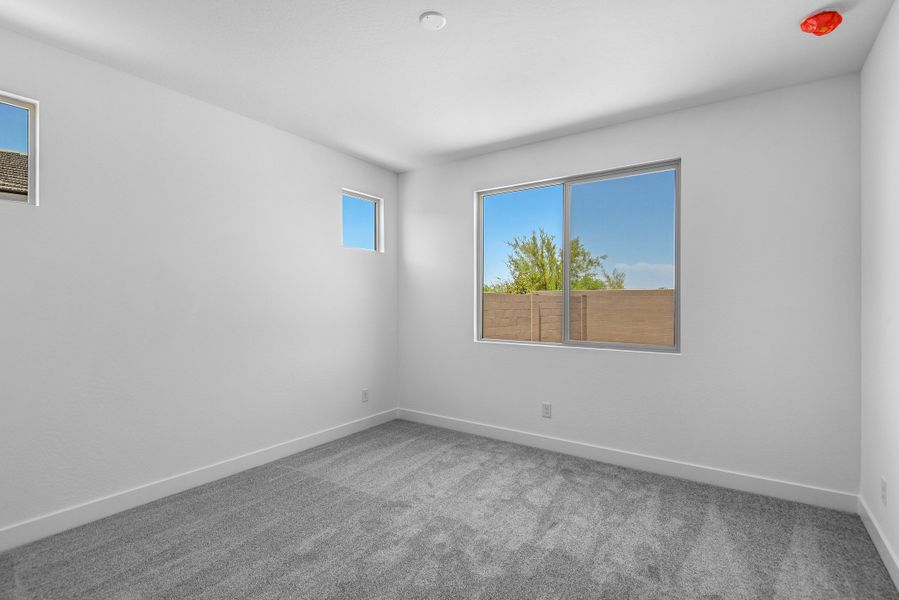 Spacious, unfurnished interior of a new home in CantaMia at Estrella 55+, Goodyear (Image 19).