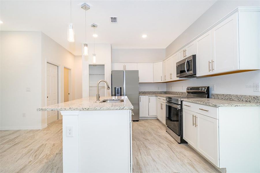 Furnished interior view inside a new home in , Kissimmee (Image 8). Furnished interior view inside a new home in , Kissimmee (Image 8).