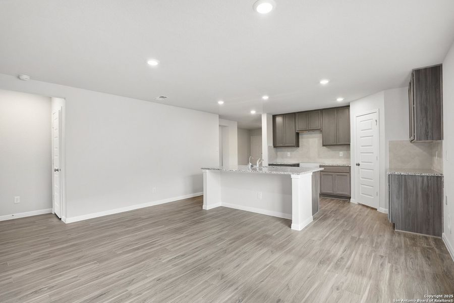 Furnished interior view inside a new home in Hunters Ranch, San Antonio (Image 10).