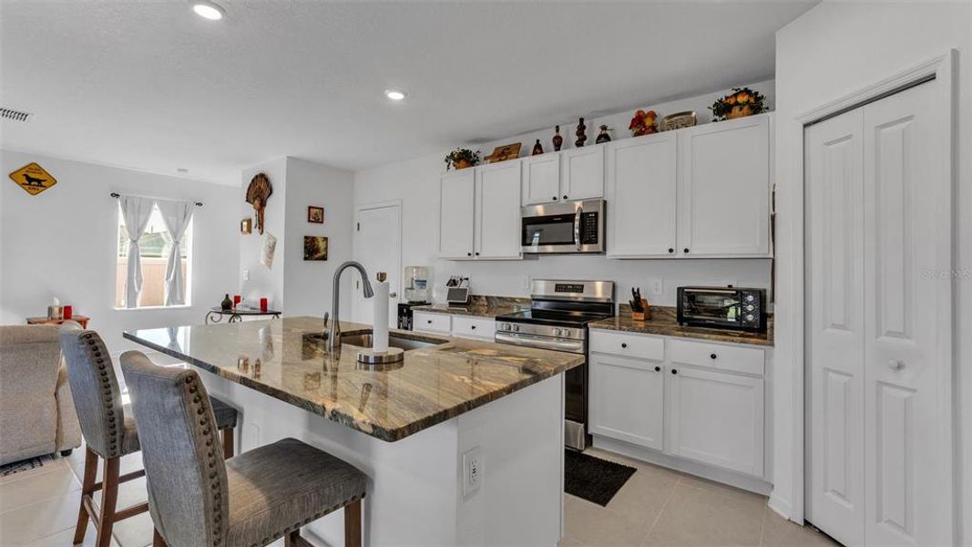 Furnished interior view inside a new home in Peace Creek Reserve, Winter Haven (Image 28).
