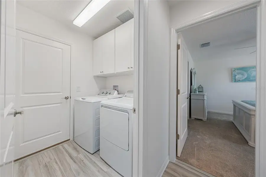 Furnished interior view inside a new home in , The Villages (Image 50).