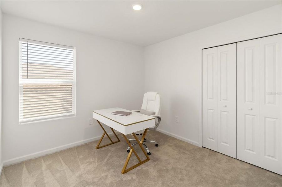 Furnished interior view inside a new home in Peace Creek Reserve: Manor Key Collection, Winter Haven (Image 22).