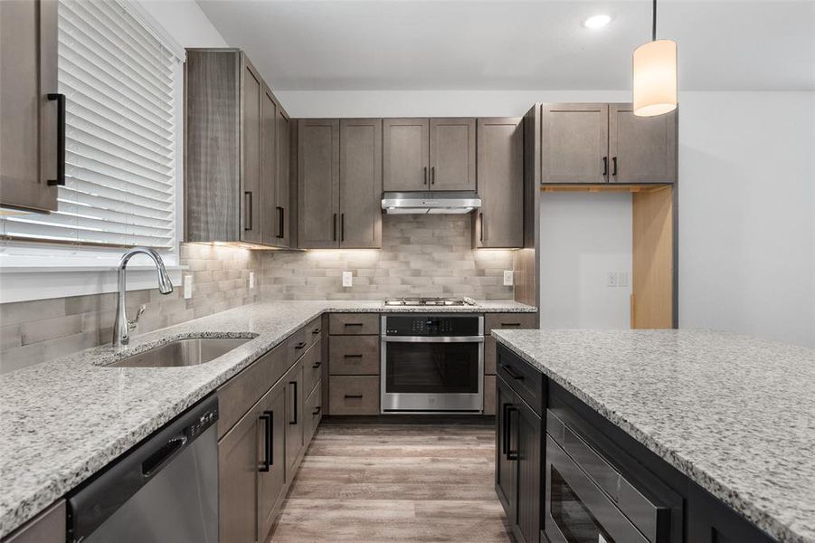 Kitchen with tile backsplash Kitchen with tile backsplash