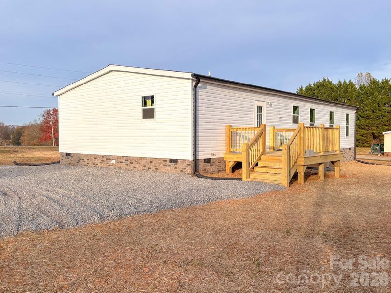 Exterior details and patio area of a home in , Lenoir (Image 14).