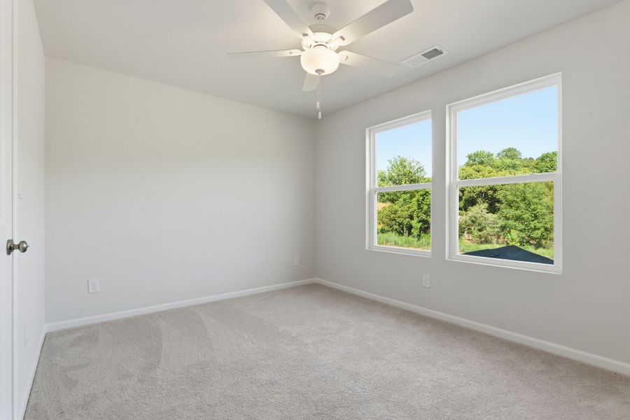 Spacious, unfurnished interior of a new home in Piper Creek, Newton (Image 32).