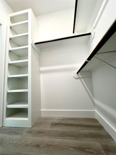 His- closet with built in shoe shelfs