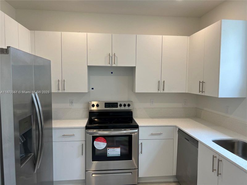 Furnished interior view inside a new home in , Pembroke Pines (Image 10).