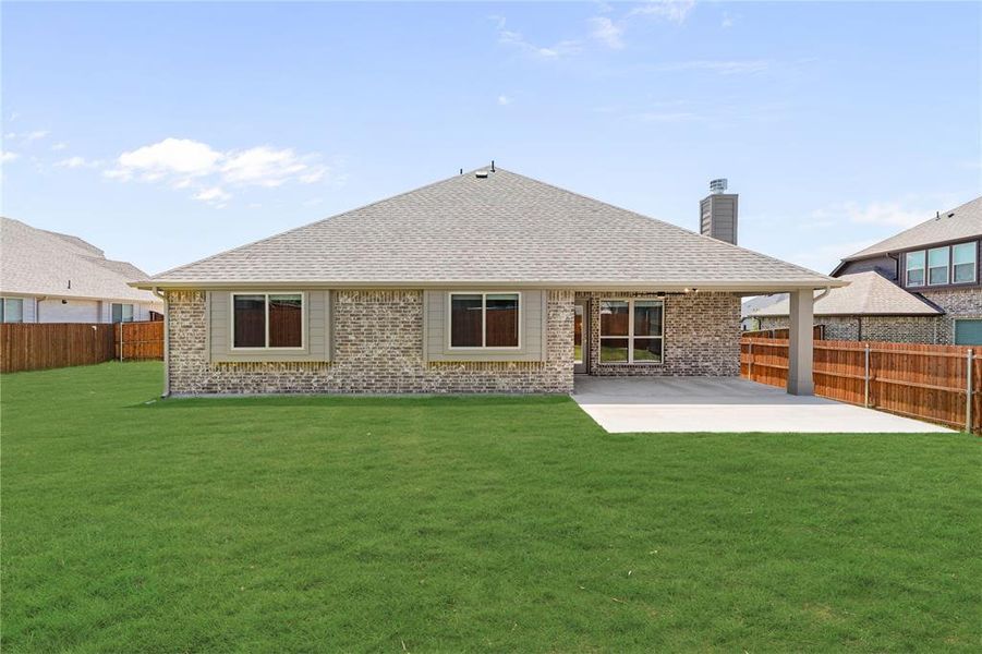 Exterior details and patio area of a home in Hayes Crossing, Midlothian (Image 20).