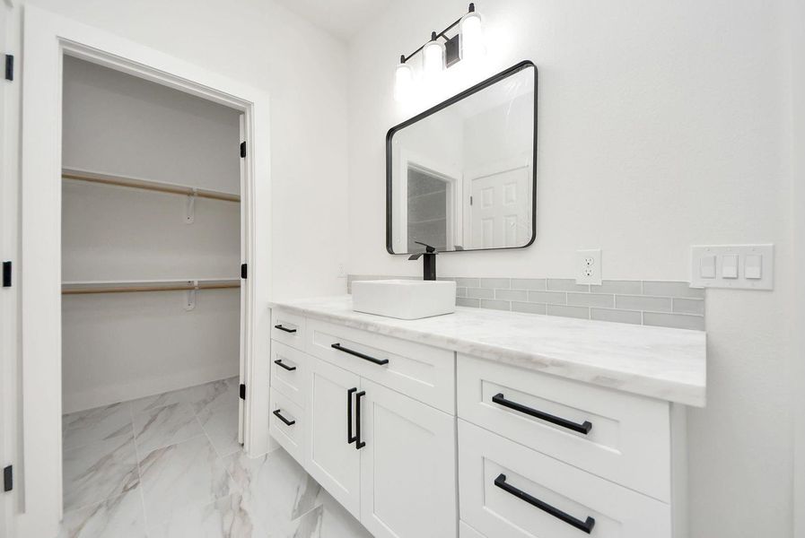 Furnished interior view inside a new home in , Conroe (Image 9).