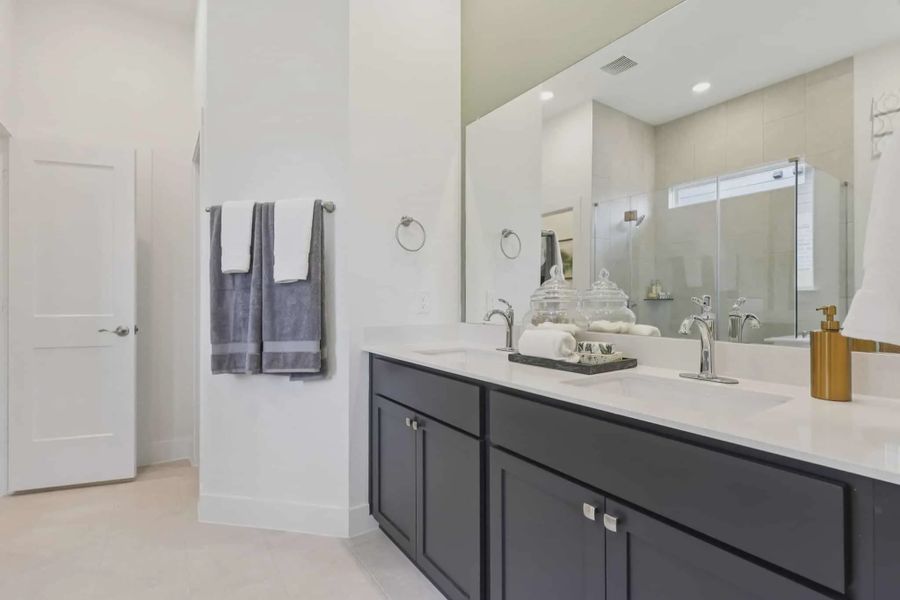 Furnished interior view inside a new home in Sunterra, Katy (Image 11).
