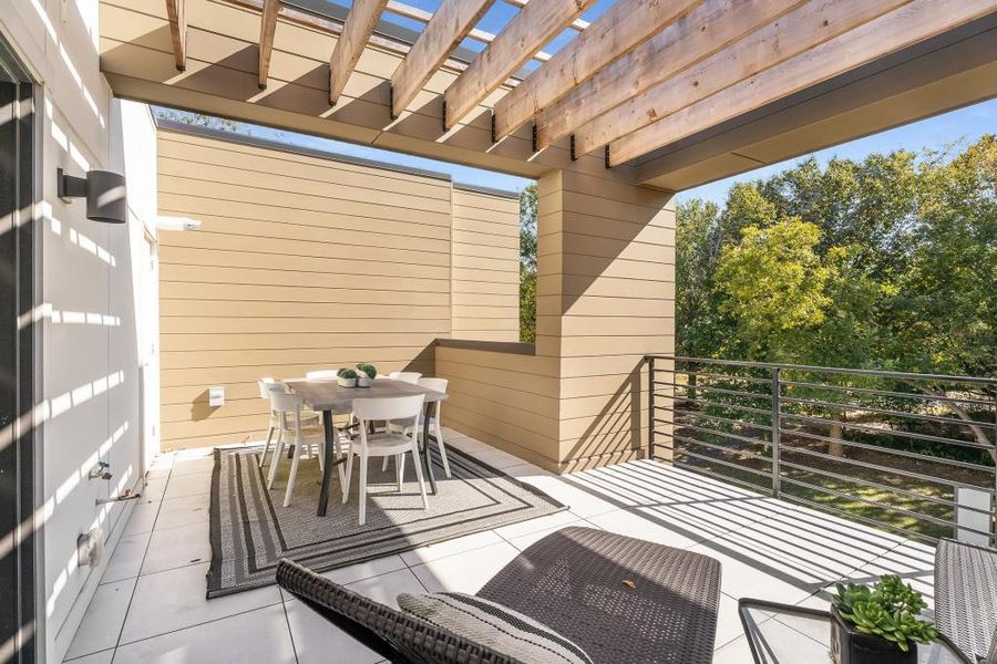Exterior details and patio area of a home in Freedom Townhomes, Atlanta (Image 25).