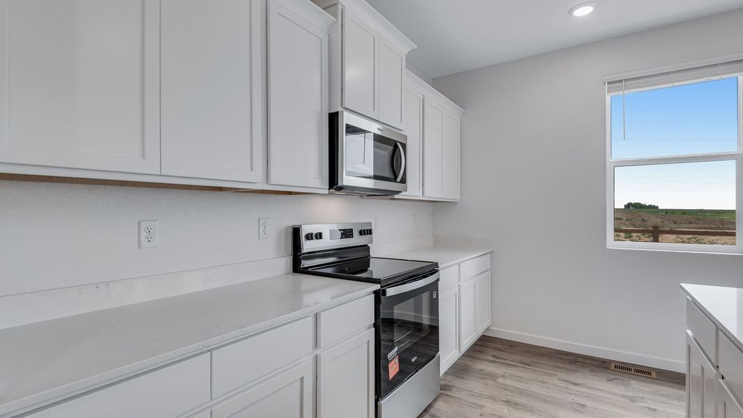 Furnished interior view inside a new home in Vista Meadows, Fort Lupton (Image 7).