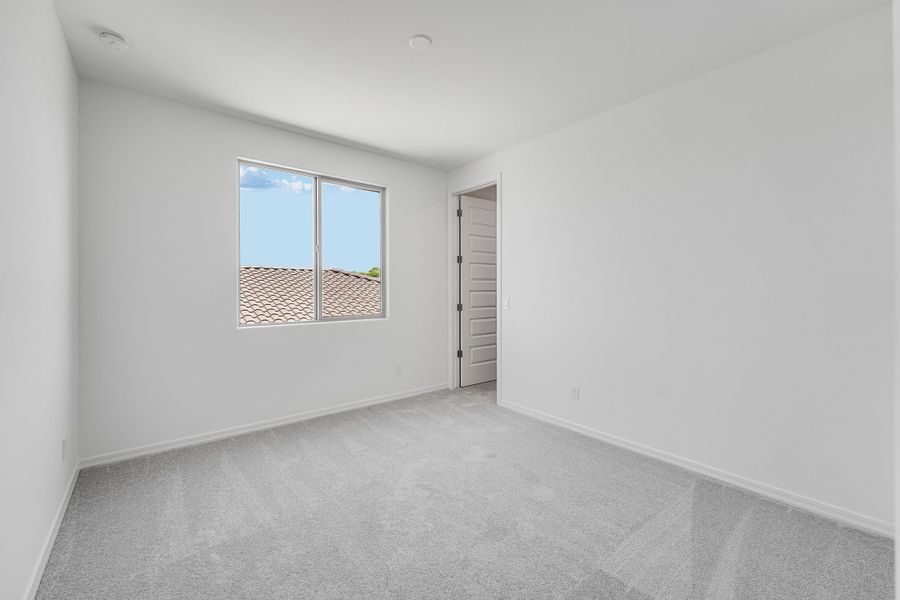 Spacious, unfurnished interior of a new home in Combs Ranch, San Tan Valley (Image 24).