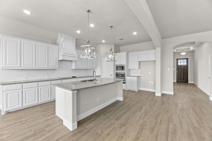 Kitchen | Concept 2796 at Coyote Crossing in Godley, TX by Landsea Homes