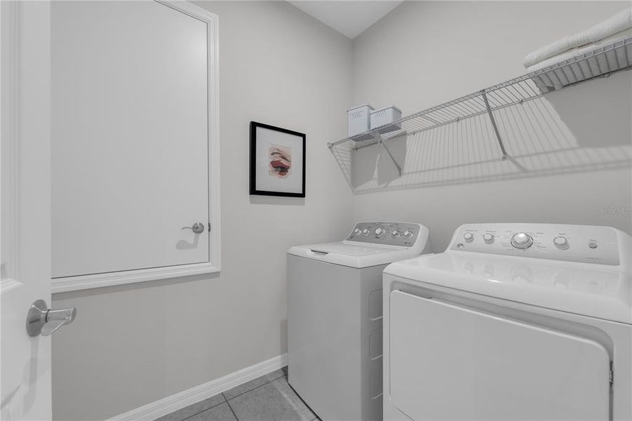 Furnished interior view inside a new home in Covered Bridge at Liberty Bluff, Haines City (Image 4). Furnished interior view inside a new home in Covered Bridge at Liberty Bluff, Haines City (Image 4).