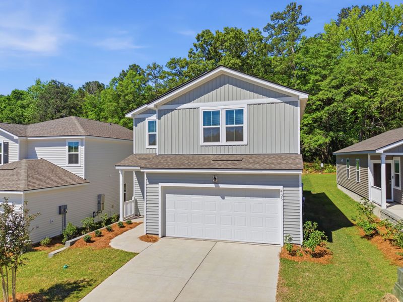 Front exterior of a new home in Grand Arbor, Blythewood, SC, highlighting curb appeal (Image 19). Front exterior of a new home in Grand Arbor, Blythewood, SC, highlighting curb appeal (Image 19).