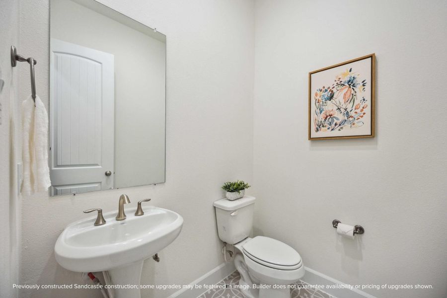 This powder bath may be petite, but it’s polished to perfection. With sleek fixtures and a splash of charm, it’s the kind of space guests will remember. This powder bath may be petite, but it’s polished to perfection. With sleek fixtures and a splash of charm, it’s the kind of space guests will remember.