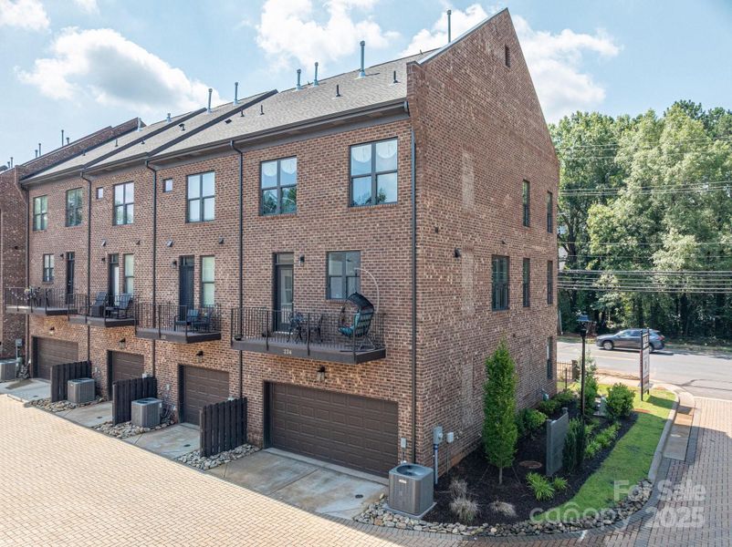 Front exterior of a new home in , Huntersville, NC, highlighting curb appeal (Image 20).