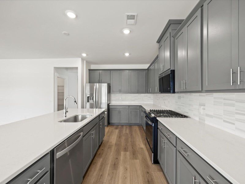 Furnished interior view inside a new home in The Coves at Lakes of Cane Bay II, Summerville (Image 9).