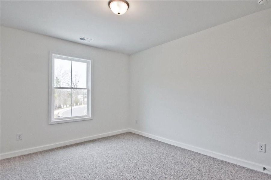 Spacious, unfurnished interior of a new home in River Walk Place, Lawrenceville (Image 25).