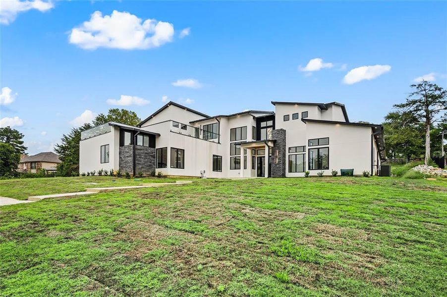 Front exterior of a new home in , Southlake, TX, highlighting curb appeal (Image 20).