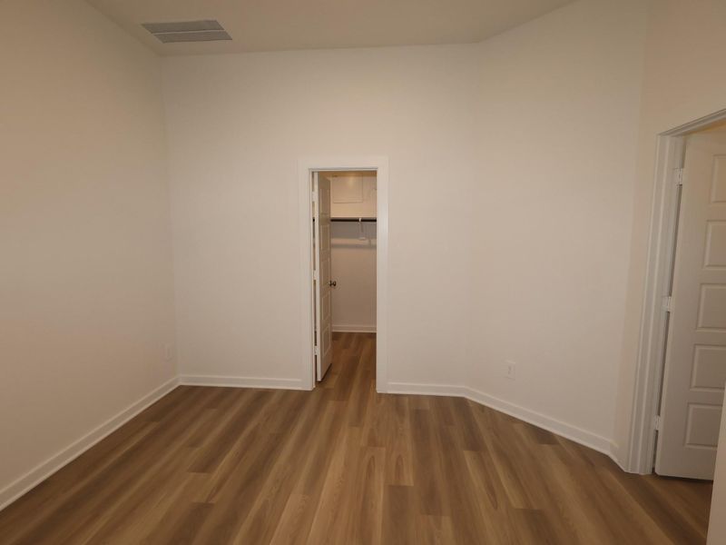 Spacious, unfurnished interior of a new home in Pinewood at Grand Texas, New Caney (Image 26).