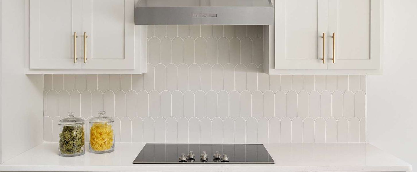 Close up of the cabinets, countertop and backsplash in AW Collection® Serene - Representative images and renderings are for illustrative purposes Close up of the cabinets, countertop and backsplash in AW Collection® Serene - Representative images and renderings are for illustrative purposes