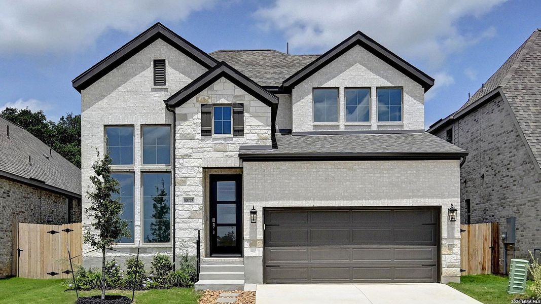 Front exterior of a new home in Kallison Ranch, San Antonio, TX, highlighting curb appeal (Image 2). Front exterior of a new home in Kallison Ranch, San Antonio, TX, highlighting curb appeal (Image 2).