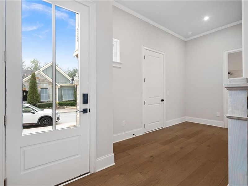 Spacious, unfurnished interior of a new home in The Village at Towne Lake, Woodstock (Image 24).