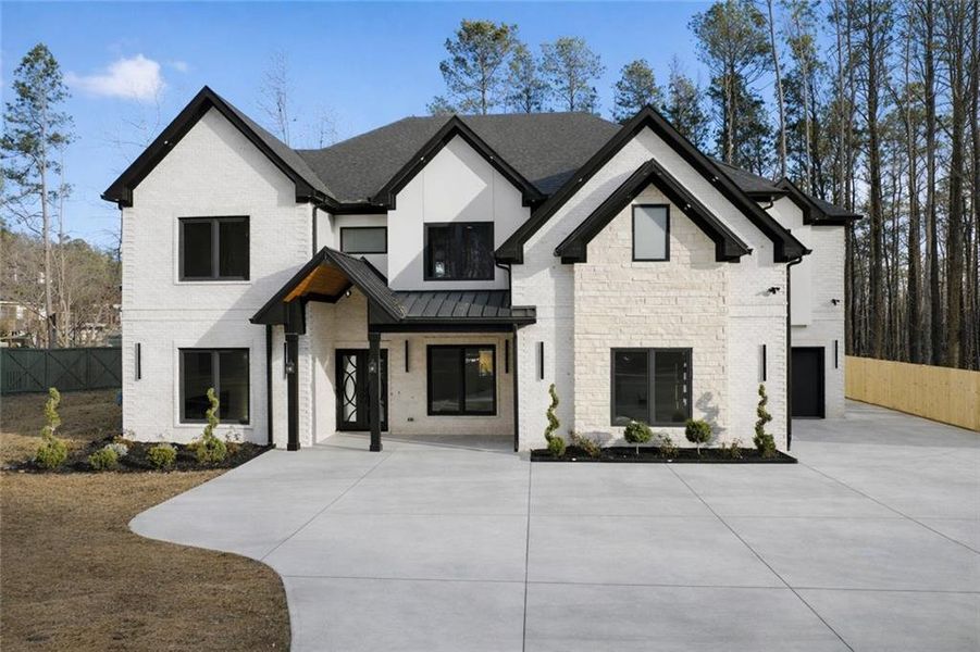 Front exterior of a new home in , Lawrenceville, GA, highlighting curb appeal (Image 34).