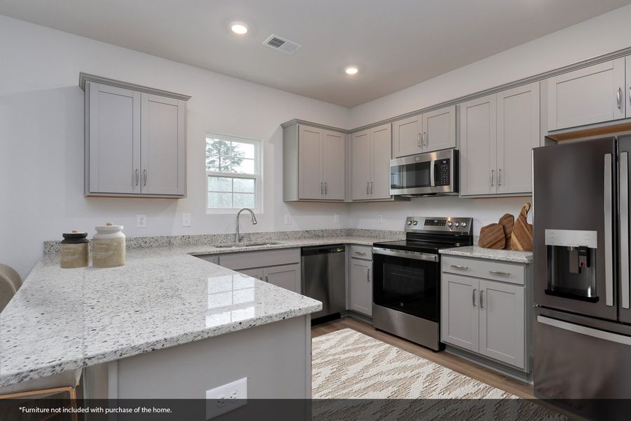 Furnished interior view inside a new home in Hainer Place, Conway (Image 4).