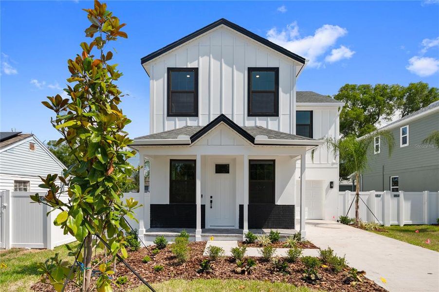 Front exterior of a new home in , St. Petersburg, FL, highlighting curb appeal (Image 26). Front exterior of a new home in , St. Petersburg, FL, highlighting curb appeal (Image 26).