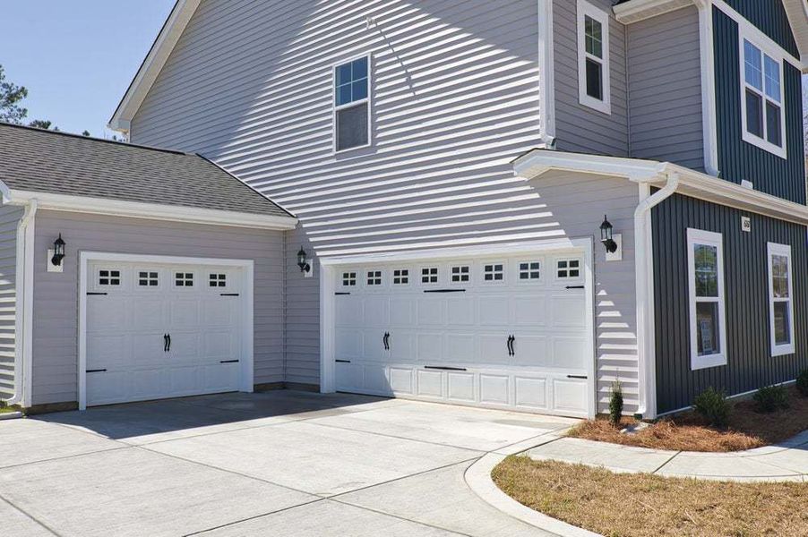 Elevation F with 3-Car Sideload Garage Option Elevation F with 3-Car Sideload Garage Option