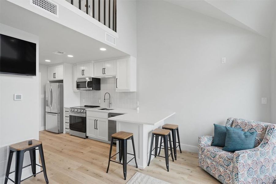 Furnished interior view inside a new home in , Strawn (Image 8).