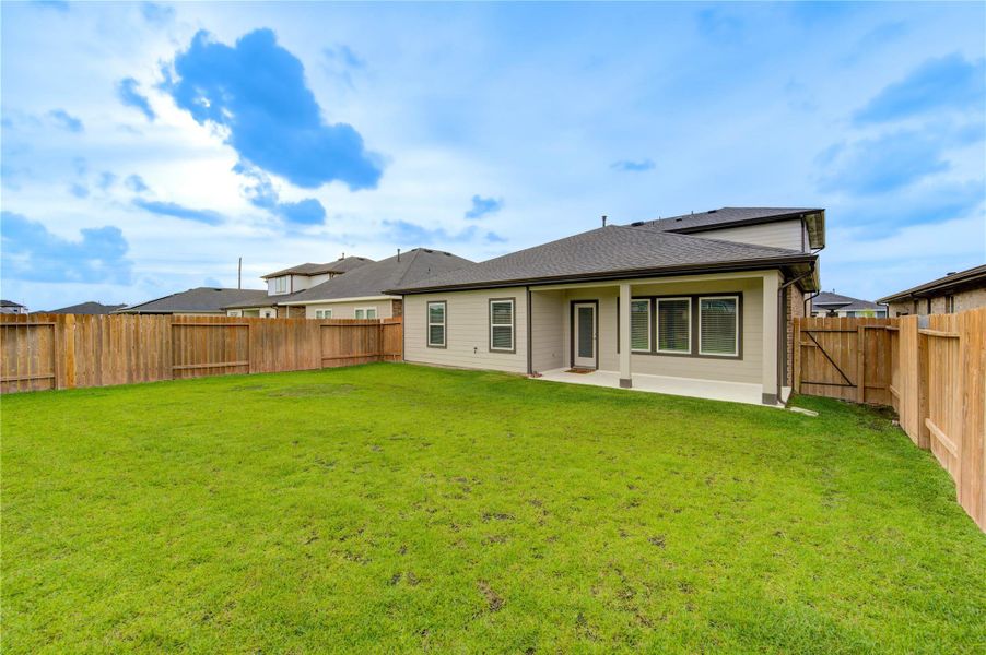 Exterior details and patio area of a home in , Katy (Image 3).