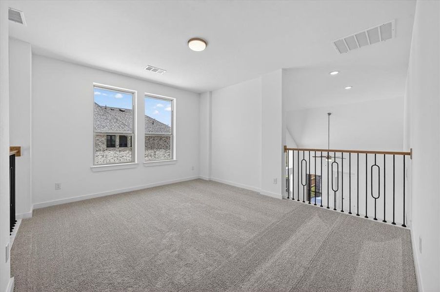 Spacious, unfurnished interior of a new home in Wellington, Haslet (Image 21).