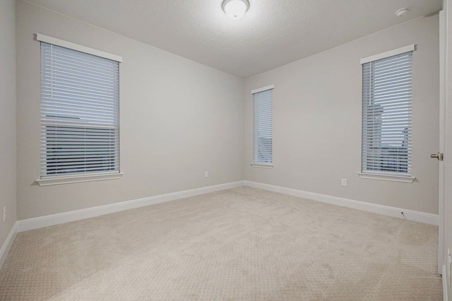 Representative unfurnished interior of a home built from the Calvin by Chesmar Homes in Heimer Estates at Garden Ridge, Fulshear (Image 19).