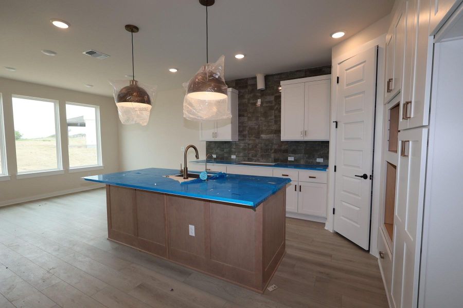 Furnished interior view inside a new home in Terrace Collection At Turner's Crossing, Buda (Image 5).