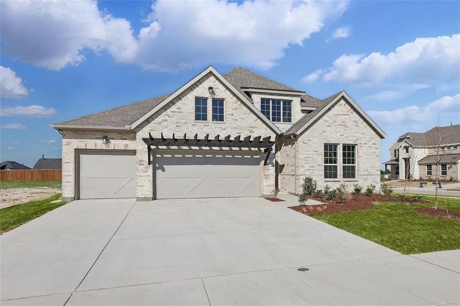 Front exterior of a new home in Lakeshore Bluffs, Shady Shores, TX, highlighting curb appeal (Image 1). Front exterior of a new home in Lakeshore Bluffs, Shady Shores, TX, highlighting curb appeal (Image 1).