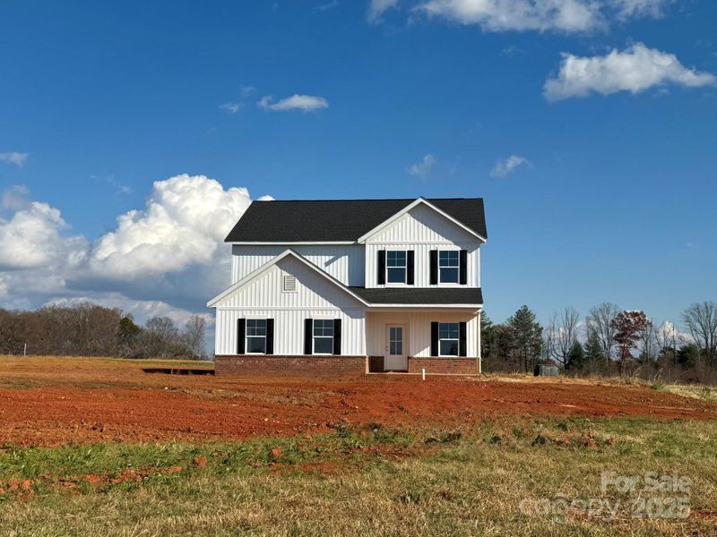 Front exterior of a new home in , Mocksville, NC, highlighting curb appeal (Image 2). Front exterior of a new home in , Mocksville, NC, highlighting curb appeal (Image 2).