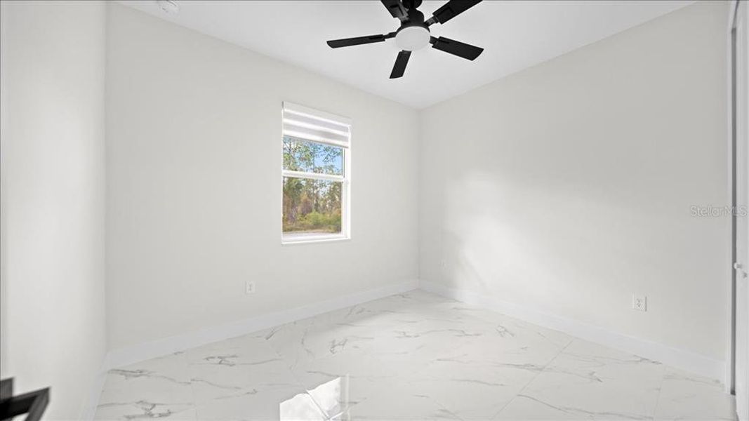 Spacious, unfurnished interior of a new home in , Port Charlotte (Image 22).