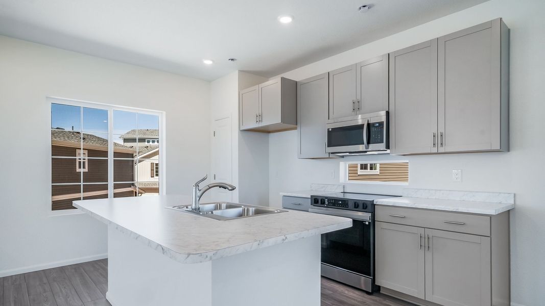 Furnished interior view inside a new home in Thompson River Ranch, Johnstown (Image 11).