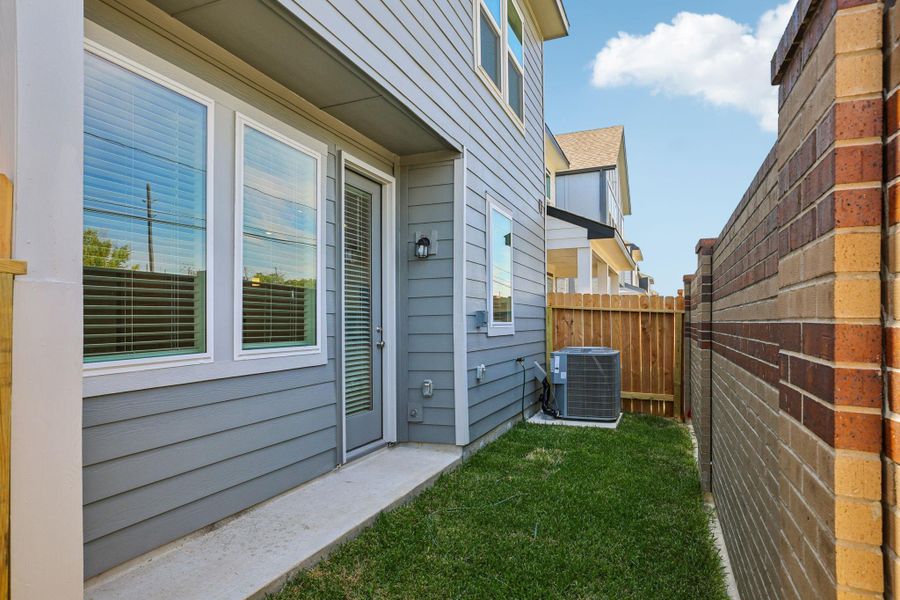 Exterior details and patio area of a home in Spring Brook Village - City Series, Houston (Image 28).
