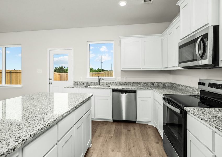 The kitchen has stainless-steel, energy-efficient appliances. The kitchen has stainless-steel, energy-efficient appliances.