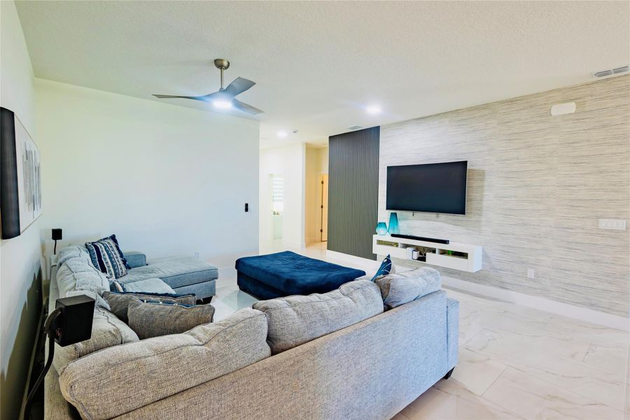 Furnished interior view inside a new home in , Port St. Lucie (Image 13).