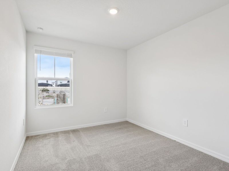 Spacious, unfurnished interior of a new home in Cagan Crossings West, Clermont (Image 11).
