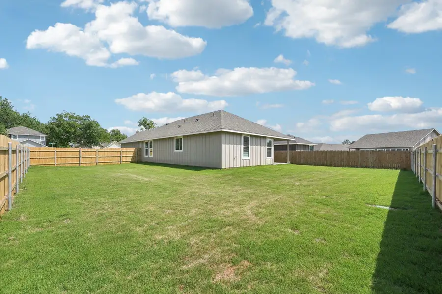 View of yard featuring a fenced backyard View of yard featuring a fenced backyard