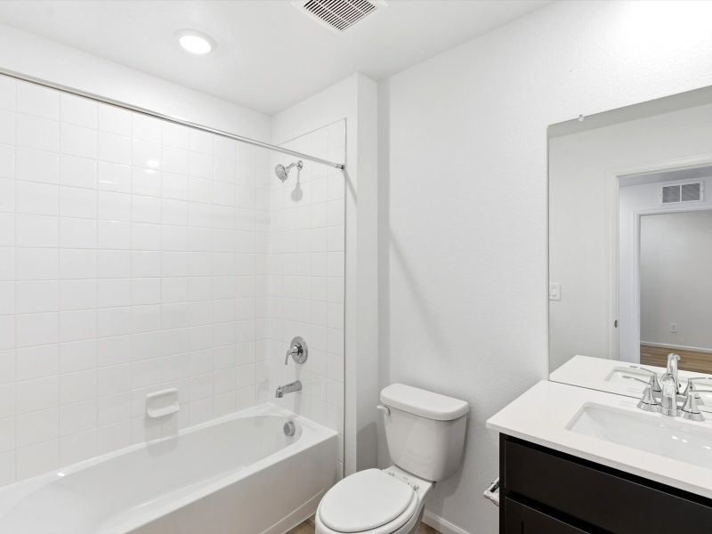 Furnished interior view inside a new home in Skyview at High Point, Aurora (Image 8).