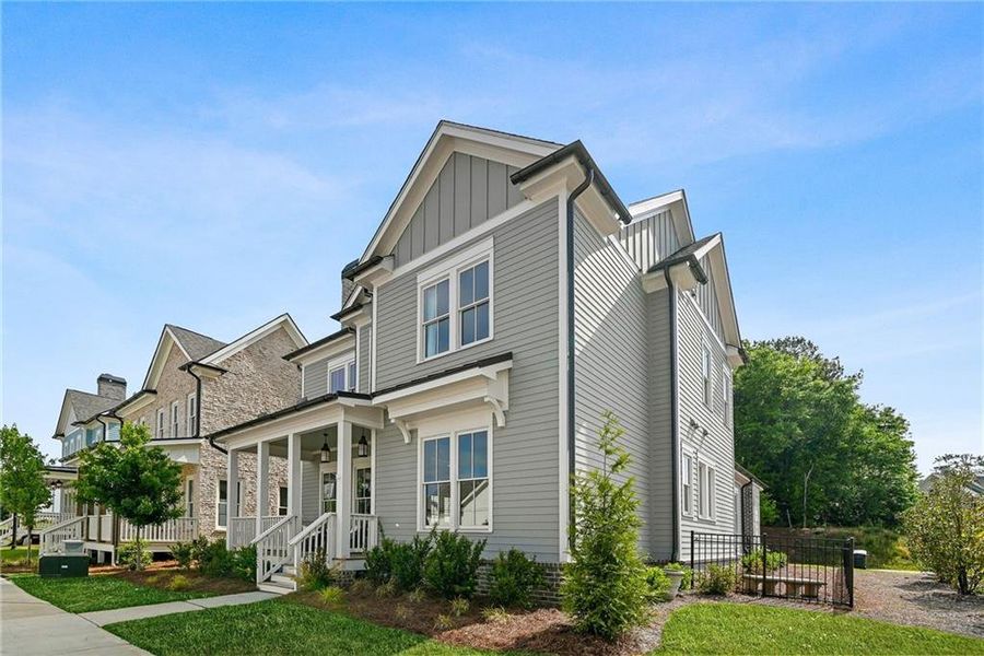 Front exterior of a new home in , Milton, GA, highlighting curb appeal (Image 21).