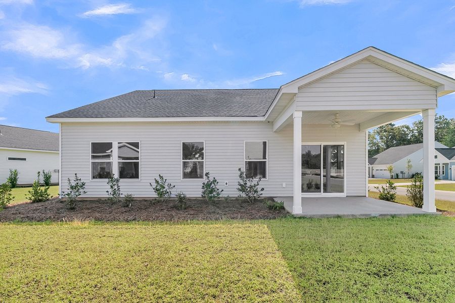 Exterior details and patio area of a home in Fairway Woods at Wyboo, Manning (Image 27).